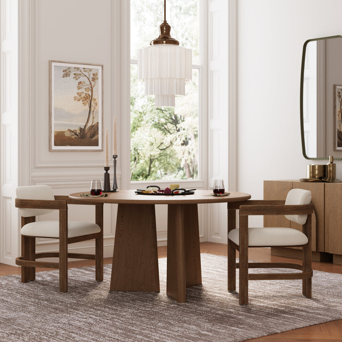 Two dark brown Nathan James Modern Boucle Wood Dining Chairs with cream seats and curved backs face a round table.