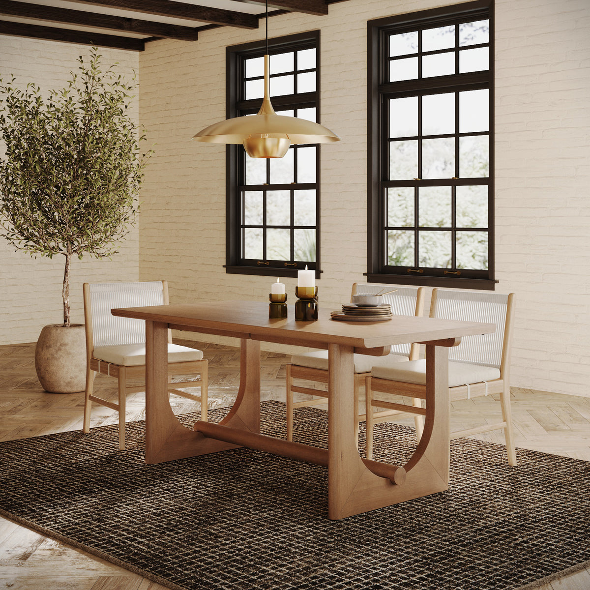 Mid-Century Extendable Wood Dining Table for 6 Light Brown in solid wood with curved trestle legs, surrounded by four chairs with woven seats.