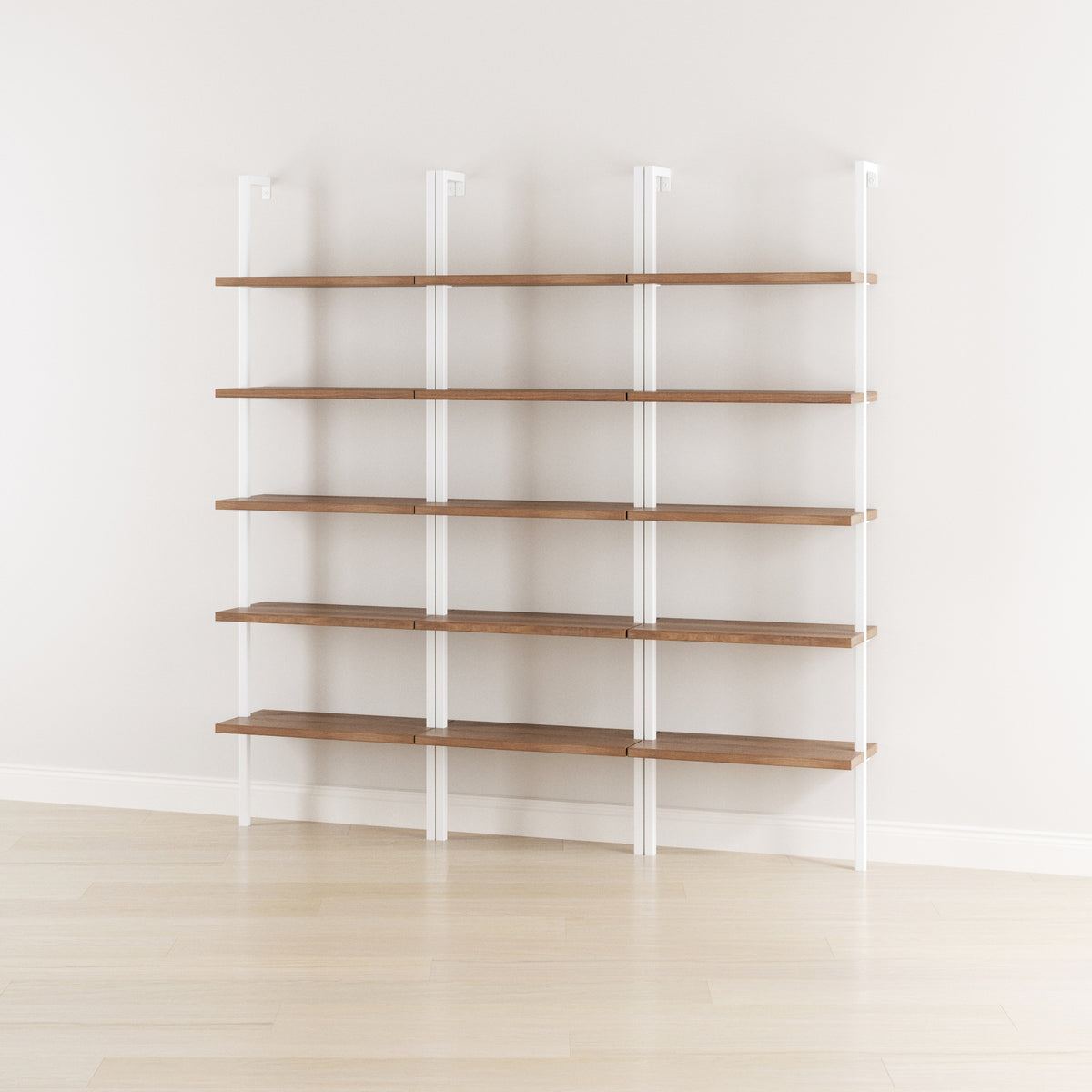 Nathan James Ladder Bookshelf Oak Matte White (Set of 3) featuring five wooden shelves supported by four white metal frames, providing an efficient wall-mounted storage solution.