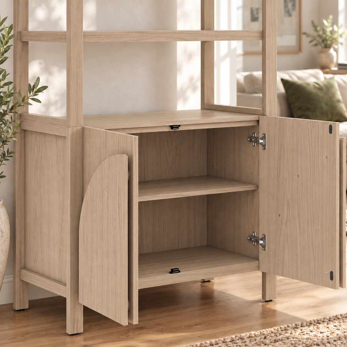 Light wood shelving unit featuring a cabinet base with two open doors revealing an interior shelf.