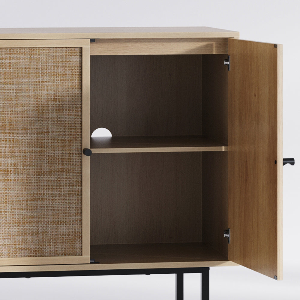 Light wood cabinet with a textured woven door panel and one open door revealing a shelf with a circular cord cutout.