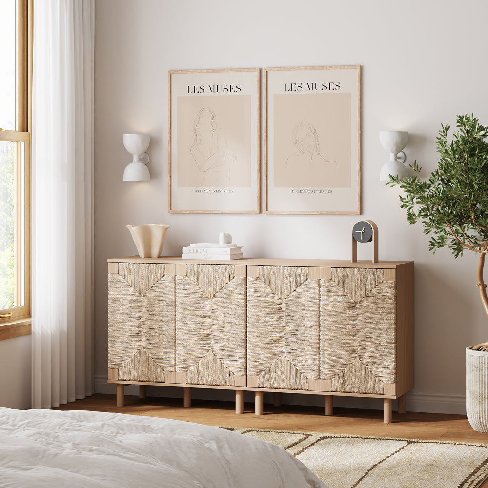 A light wood sideboard with four woven panel doors stands below two framed line art posters titled Les Muses.
