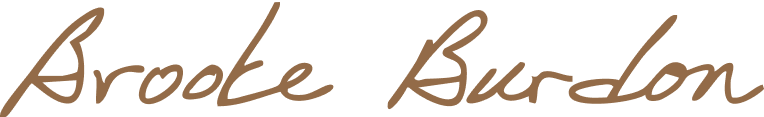 Handwritten signature in brown ink that reads Brooke Burdon on a transparent background.