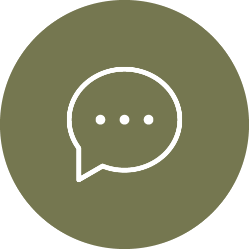 White speech bubble with three dots inside, centered on a greenish-brown circular background.