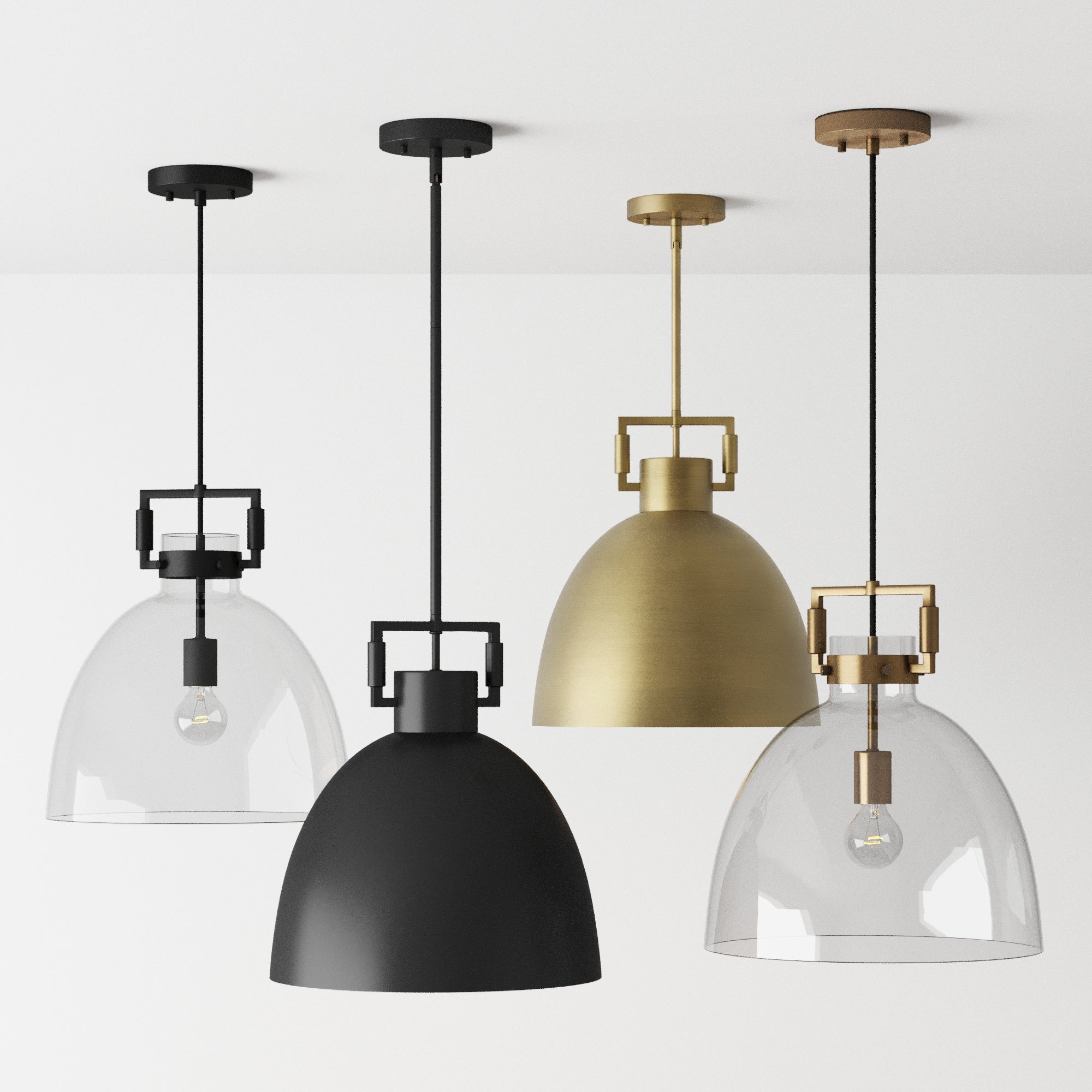 Four modern pendant lights hang from a white ceiling: two with clear glass domes, one with a matte black dome, and one with a brushed brass dome. Each light features a visible bulb and a minimalist design.
