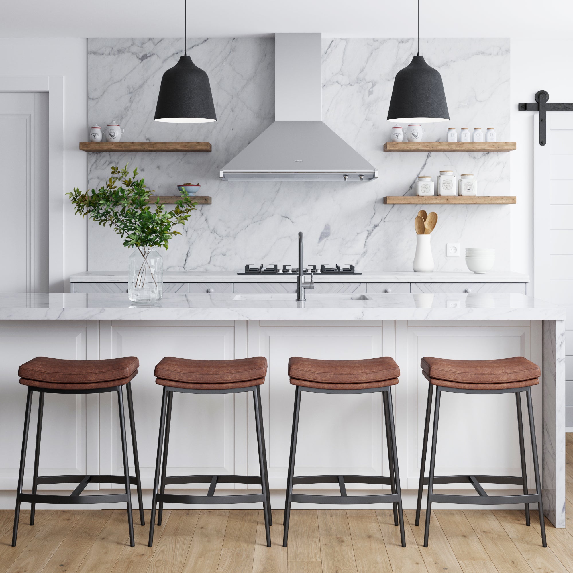 Modern kitchen with a marble island, four brown cushioned stools, shelves with dishes and jars, potted plant, pendant lights, and stainless steel range hood against a marble backsplash wall.