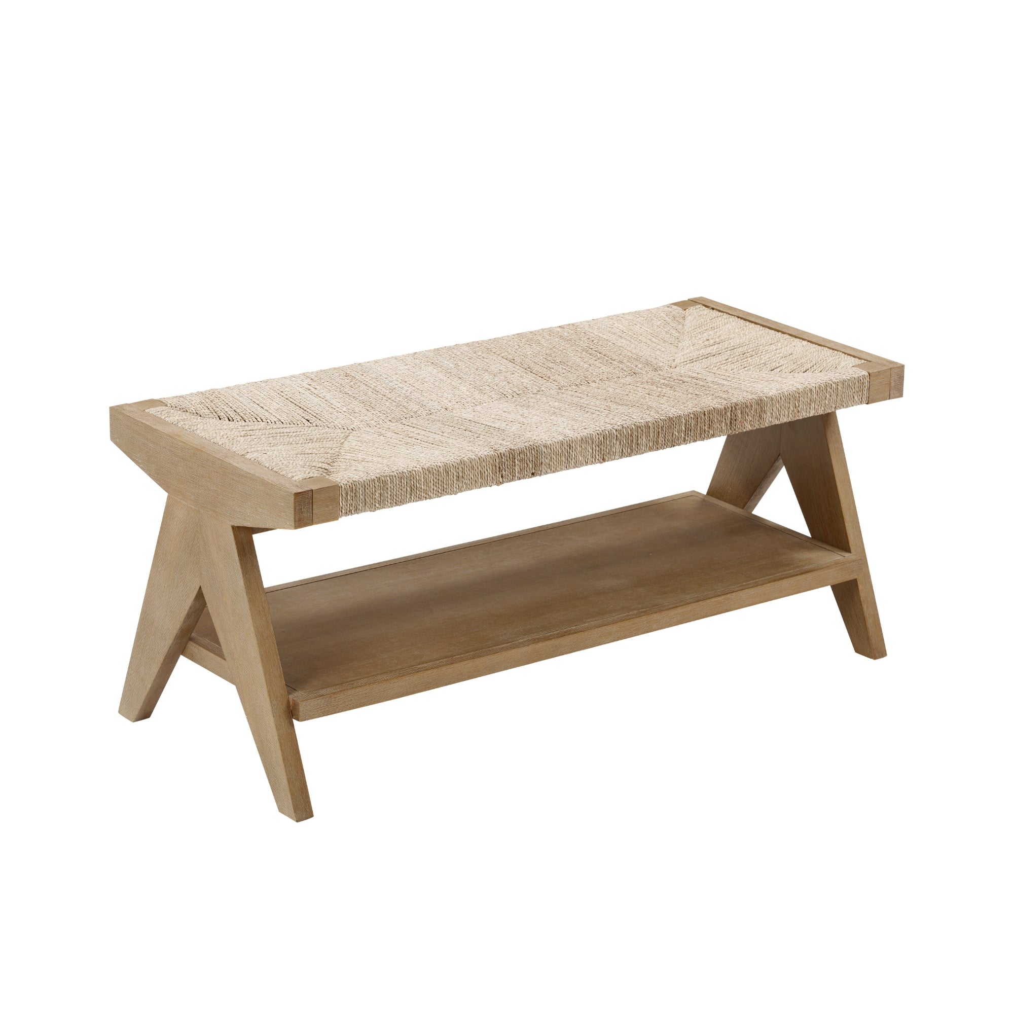 A wooden bench with angled legs, a woven rattan seat, and a lower shelf for storage, against a white background.