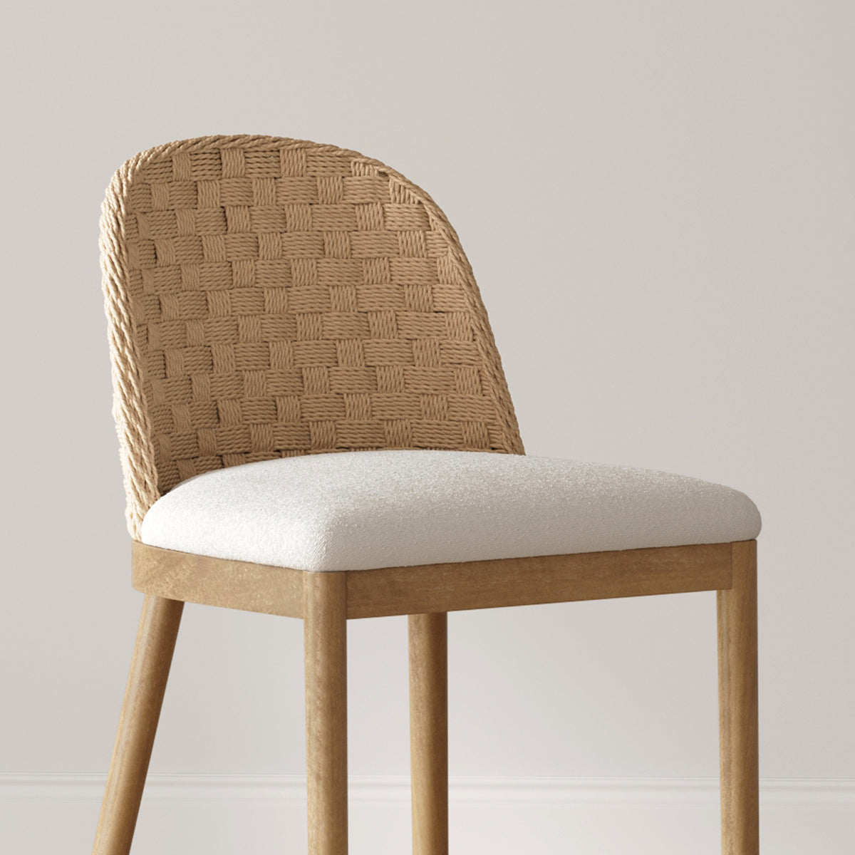 Dining chair with a woven light-brown rope backrest, white upholstered seat, and light wood frame.