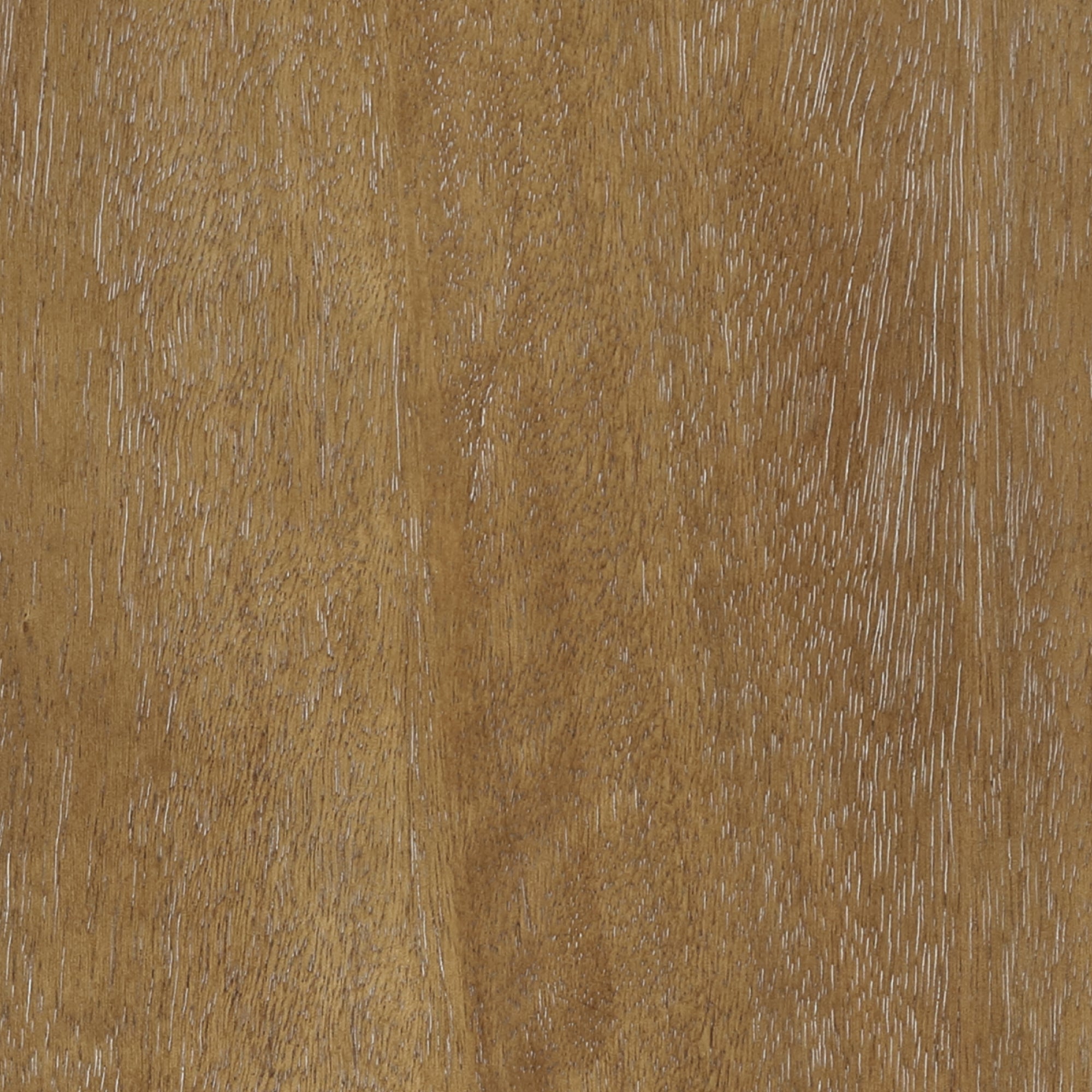 Close-up of a wooden surface with a golden-brown color and visible grain patterns, including light and dark streaks and small textured lines running across the wood.