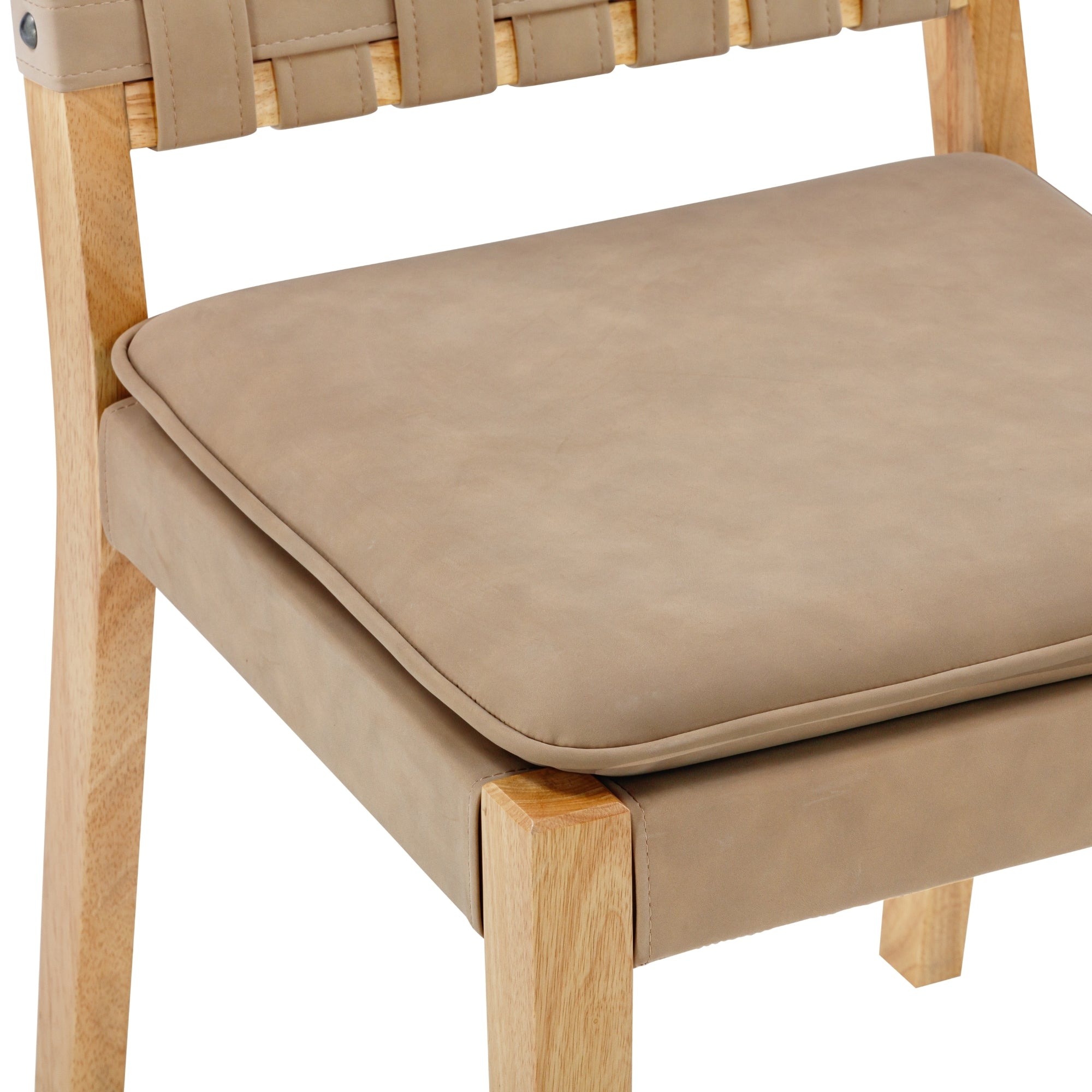 Close-up of a wooden chair with a light tan cushioned seat and a woven leather backrest. Only part of the chair is visible, showing the padded seat and two wooden legs.