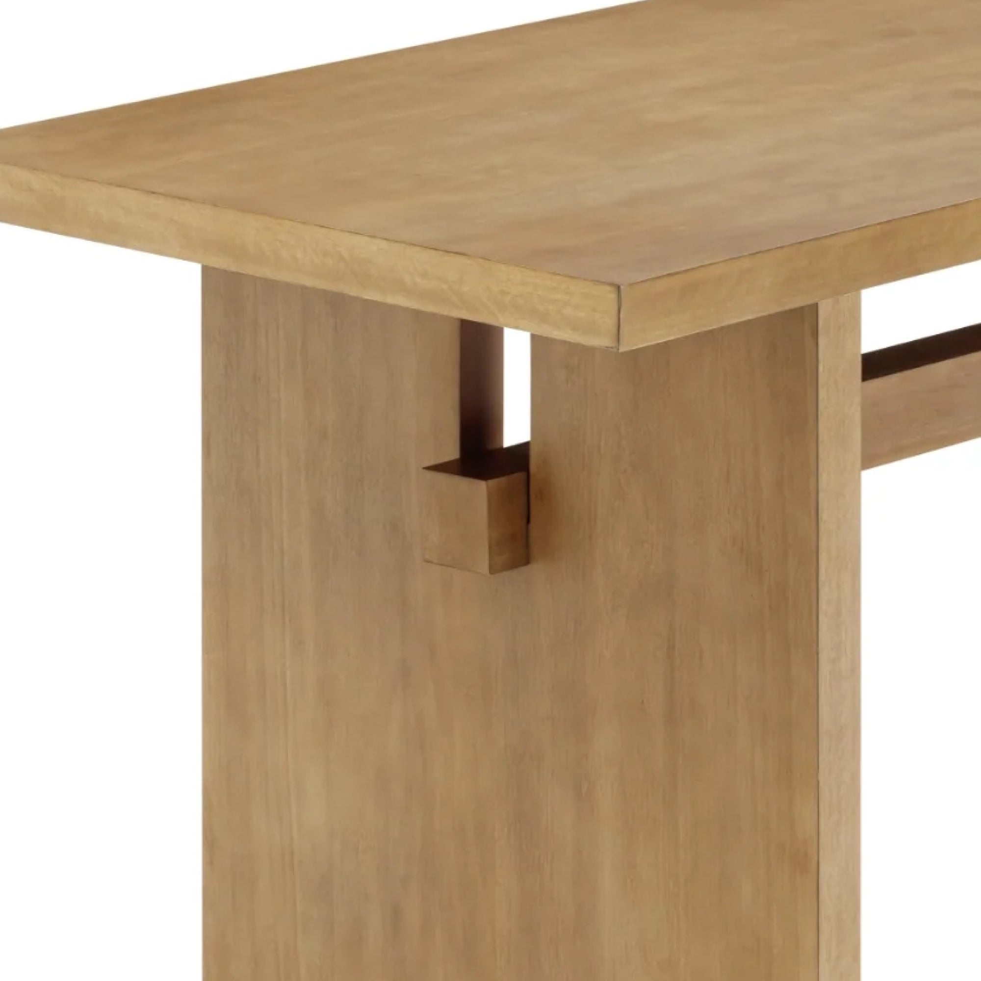 Close-up of a light brown wooden table showing the edge of the tabletop and a unique vertical support with a rectangular notch and block detail.