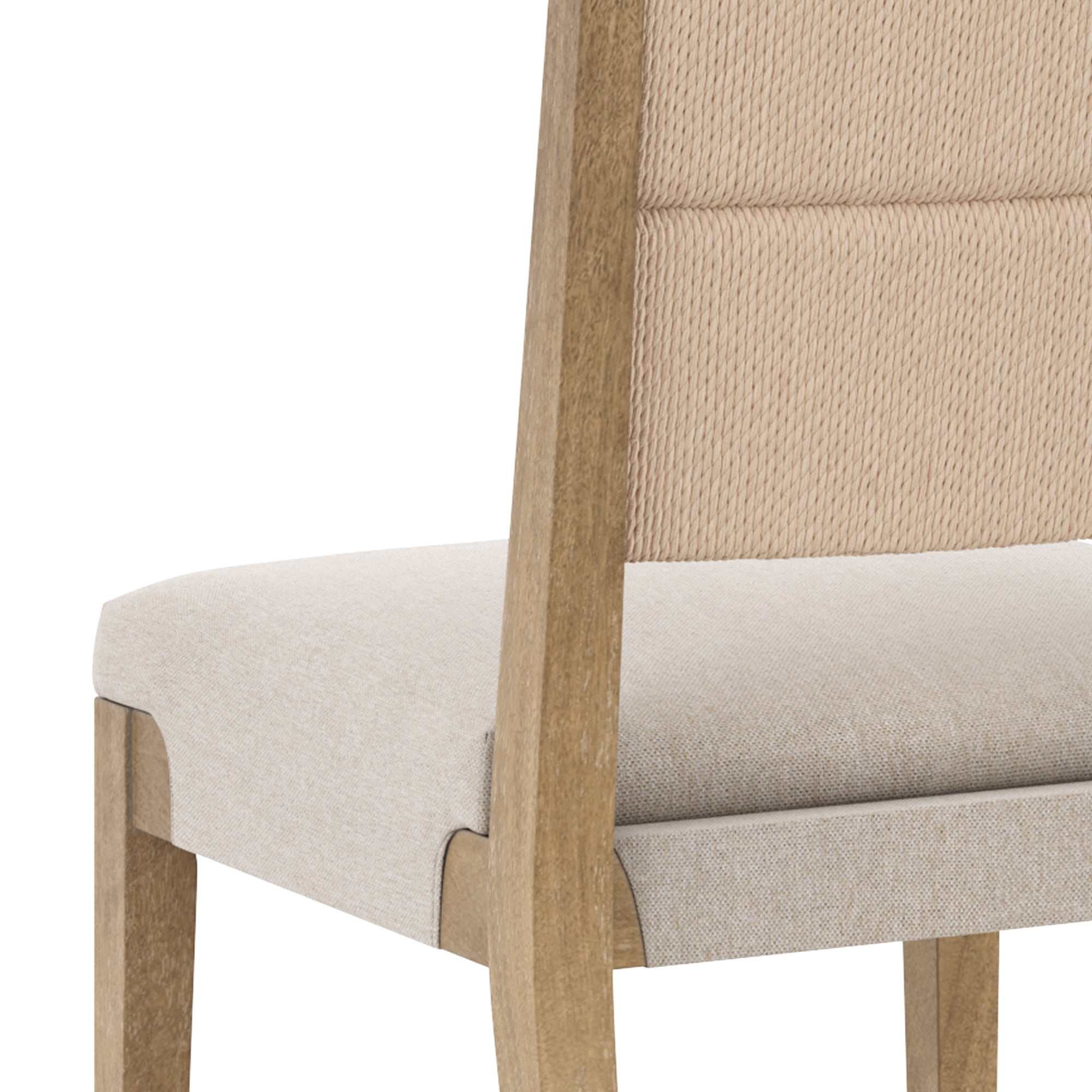 A close-up of a wooden chair with a beige cushioned seat and a textured, light-colored backrest. The legs and frame are made of light wood.