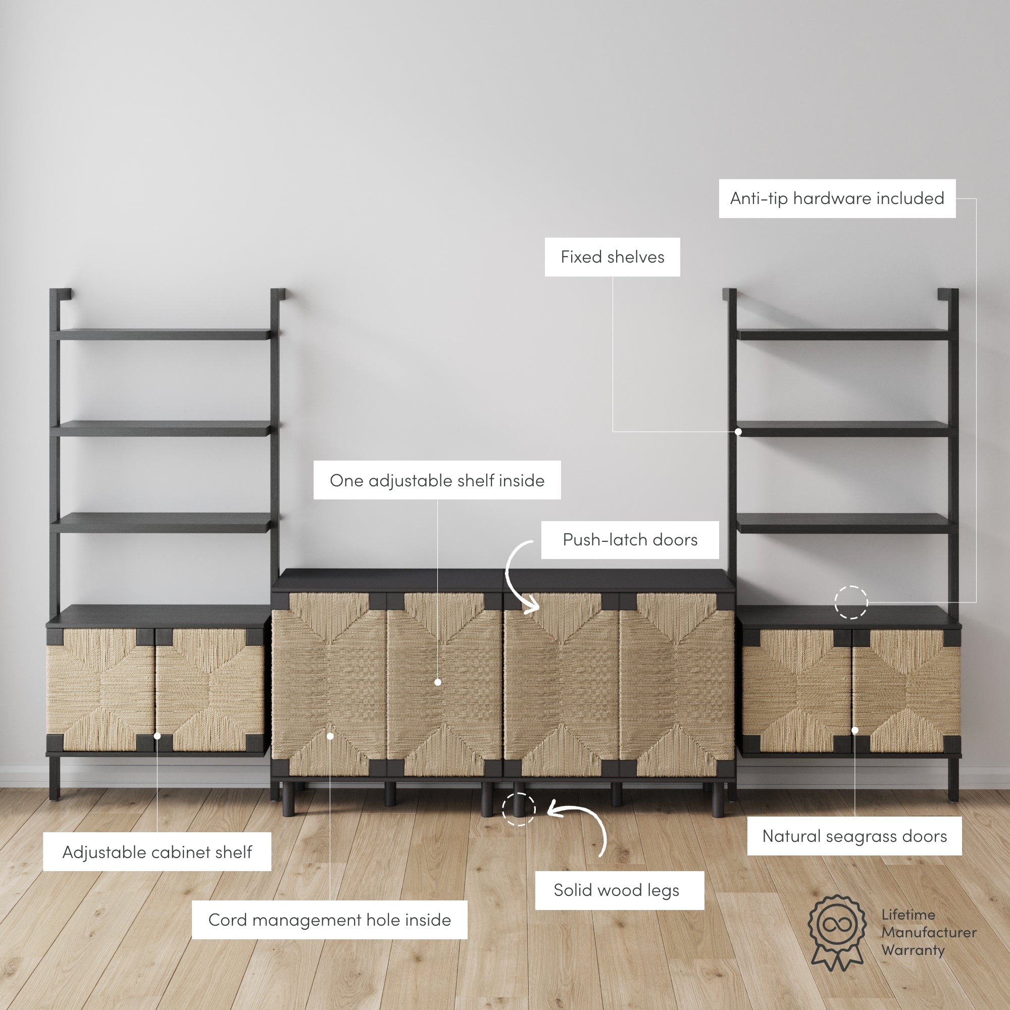 Modern black storage unit with three natural seagrass doors, solid wood legs, fixed and adjustable shelves, push-latch doors, anti-tip hardware, and cord management hole, placed against a light wall on a wooden floor.