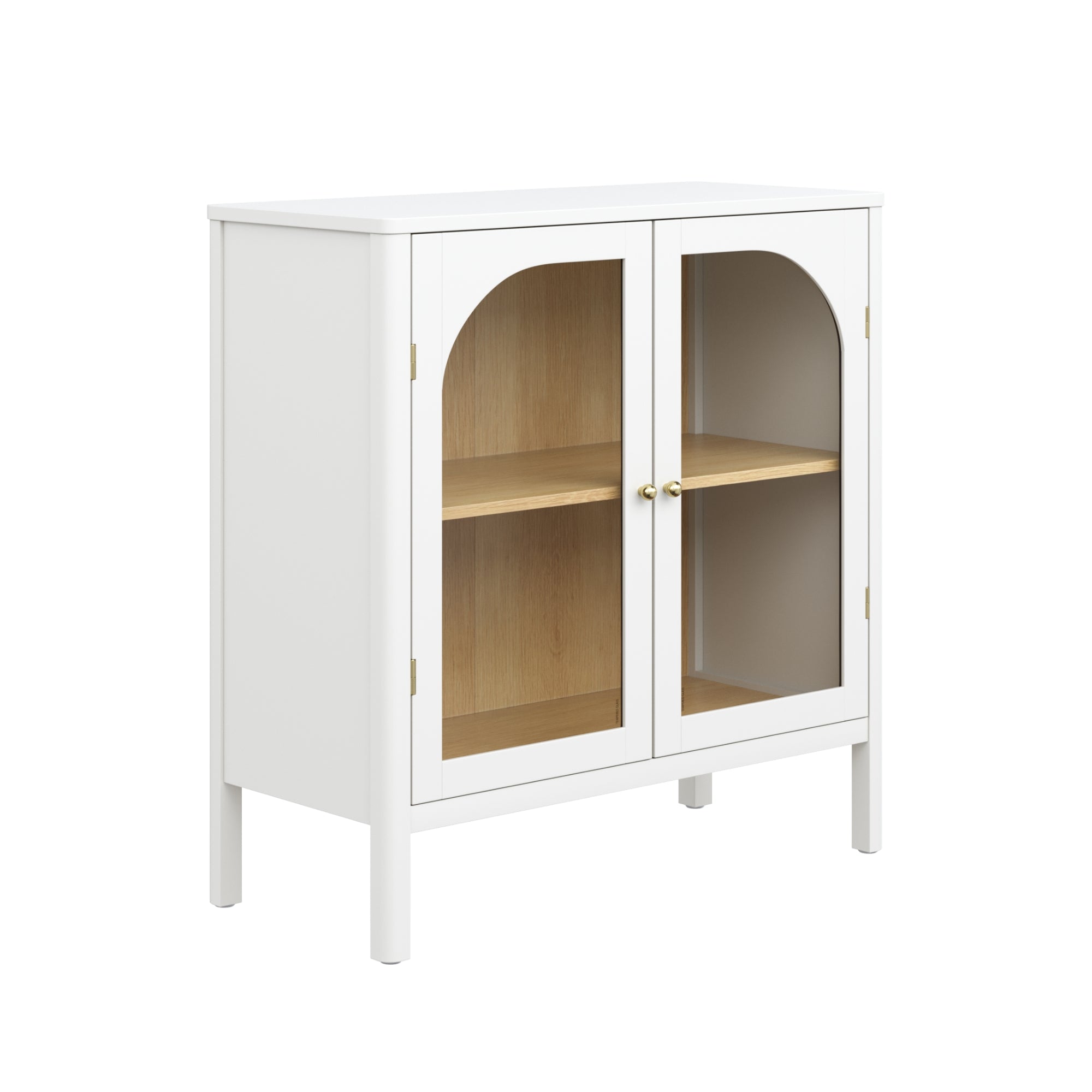 A white wooden cabinet with two glass-paneled doors, brass knobs, and an interior wooden shelf, standing on four legs against a plain white background.