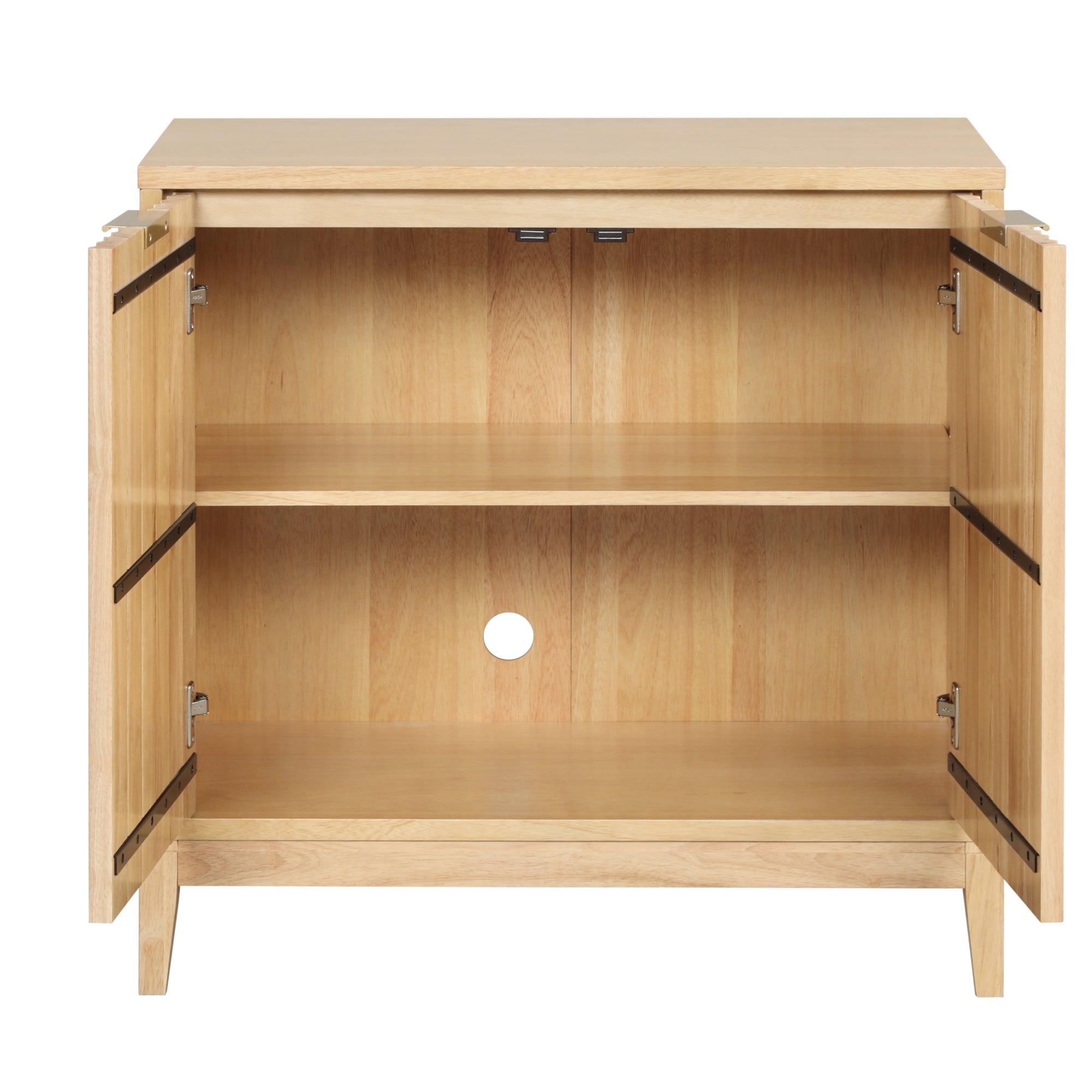 A light wood cabinet with two doors open, revealing an empty interior with a central shelf and a circular cutout at the back panel for cable management.