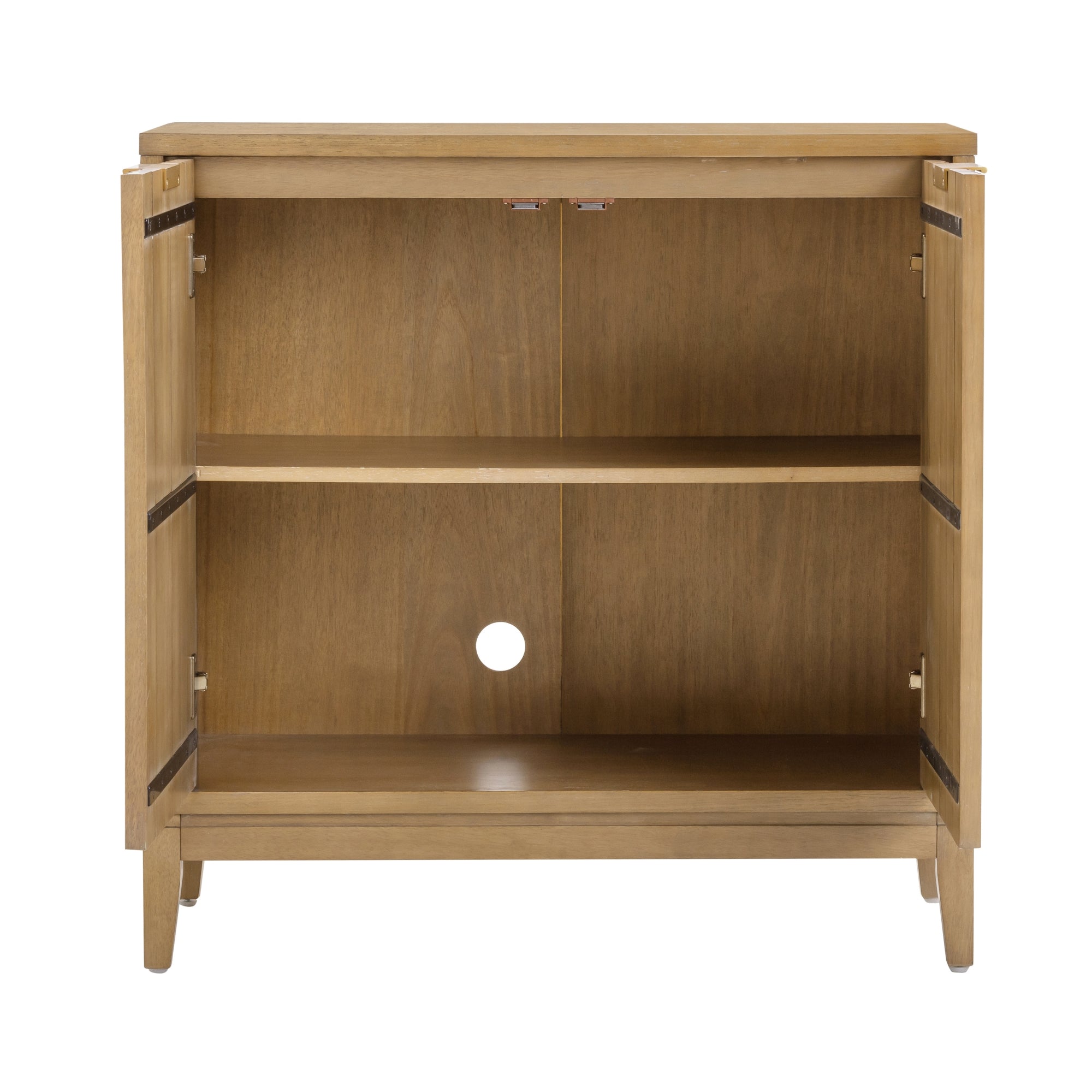 A wooden cabinet with two open doors, an interior shelf dividing the space, and a circular hole in the back panel for cable management. The cabinet has a natural wood finish and simple, clean lines.