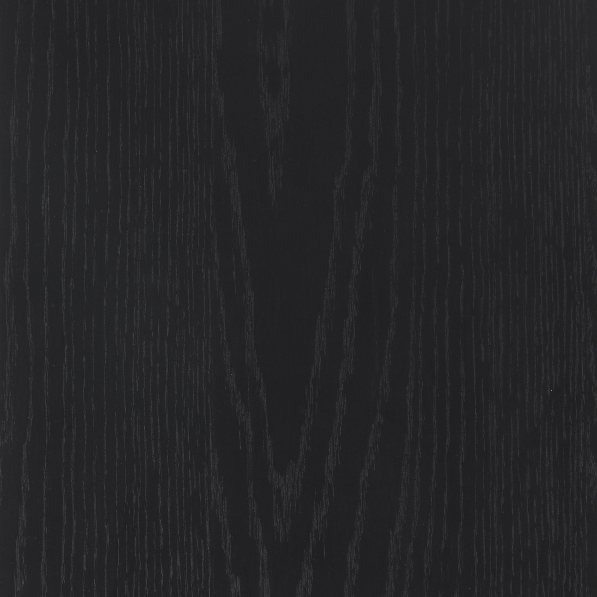 Close-up of a dark wood surface with visible grain patterns and subtle texture, featuring vertical lines and a natural, organic appearance.