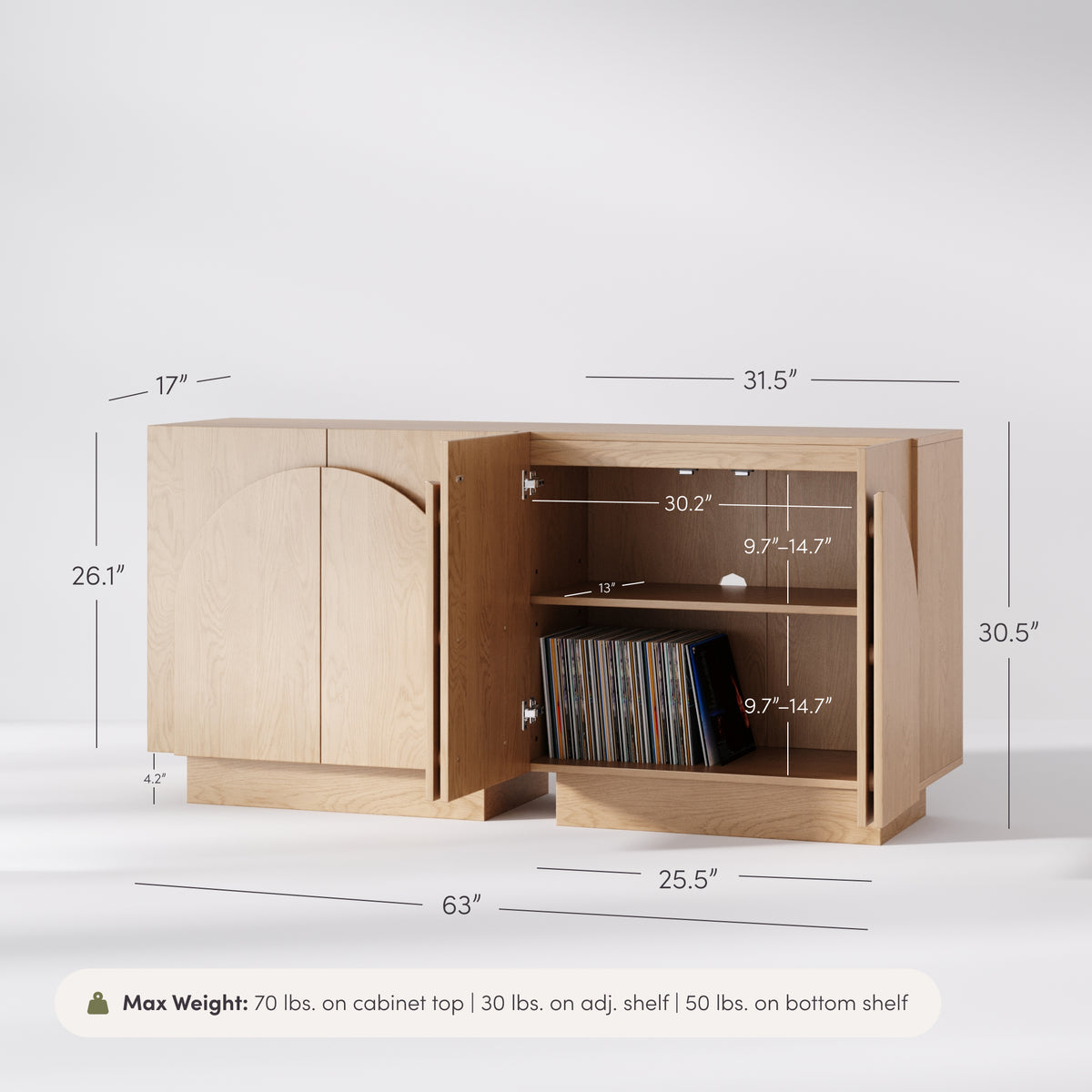 Nathan James Mid-Century Modern Wood Credenza Arched Oak cabinet with arched doors and an open side revealing an adjustable shelf filled with vinyl records, displayed with dimension labels and a weight capacity note.