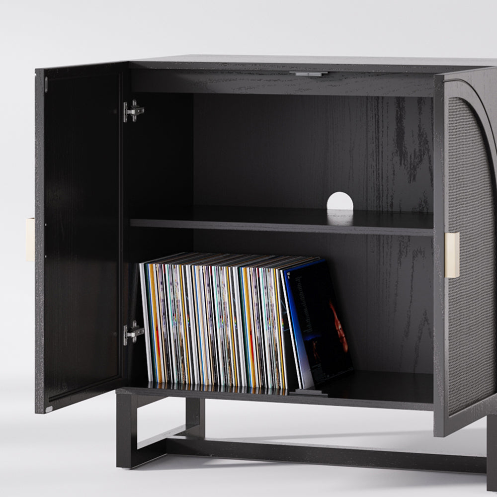Black cabinet with open doors revealing a shelf holding a row of vinyl records.