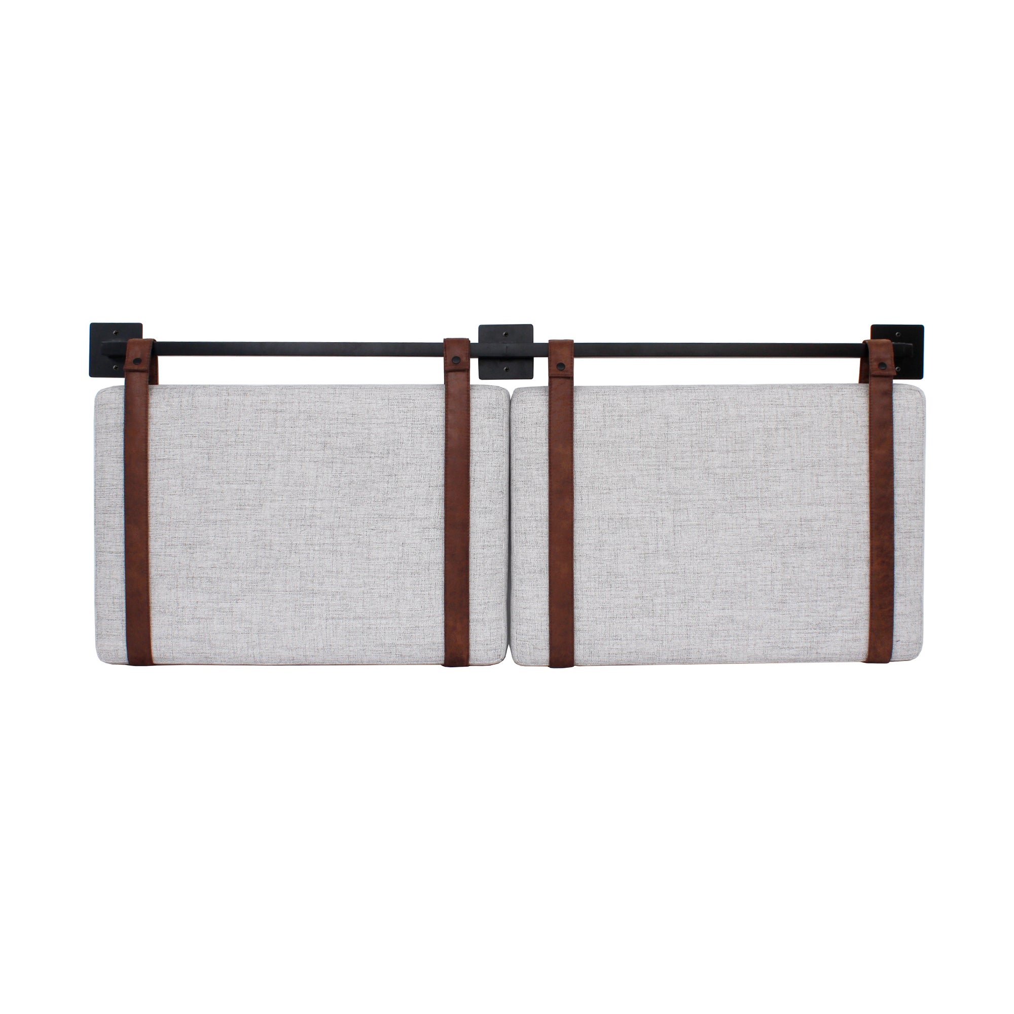 Two rectangular, light gray upholstered panels are mounted side by side on a black metal rail with dark brown leather straps, resembling sliding barn doors.