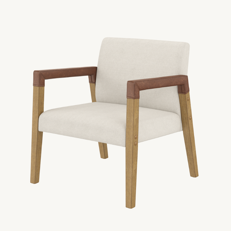 Armchair with light-colored fabric upholstery, wooden legs, and brown leather-wrapped armrests.