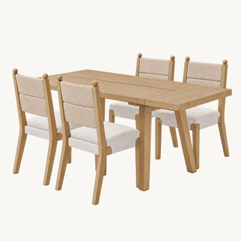 Light wood dining table with four matching chairs featuring light-colored upholstered seats and backrests.