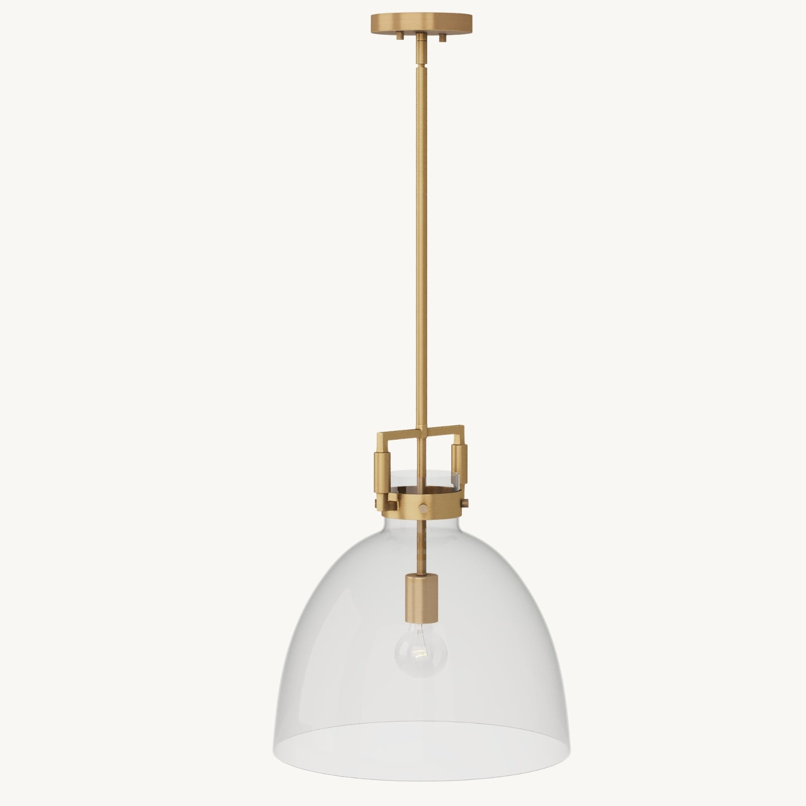 A pendant light with a clear glass dome shade, brass metal hardware, and an exposed light bulb, suspended from a brass rod and ceiling mount.