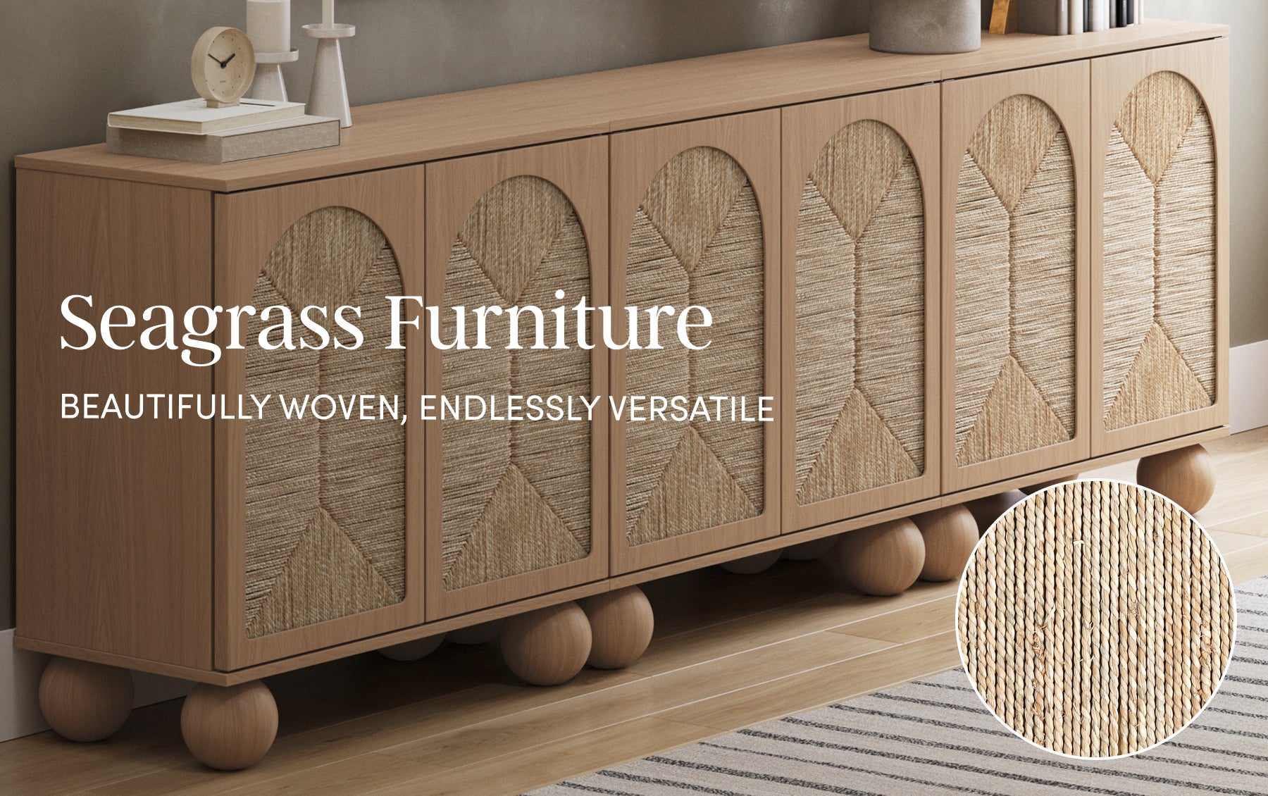 A wooden sideboard with seagrass woven cabinet doors stands on round wooden legs. A rug and decorative items are on top, with a close-up inset showing the woven seagrass texture. Text reads: Seagrass Furniture. Beautifully woven, endlessly versatile.
